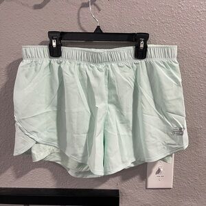 New Balance Women's Light Green Athletic Shorts